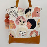 Faces On White Tote Bag